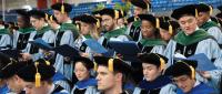 Graduates in caps and gowns.